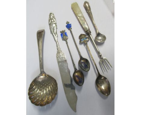 A collection of flatware, to include a silver sifting spoon, a silver spoon with enamel decoration, an 1871 John Larson &amp;