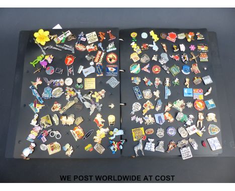 Two folders of vintage collectable badges, advertising etc.