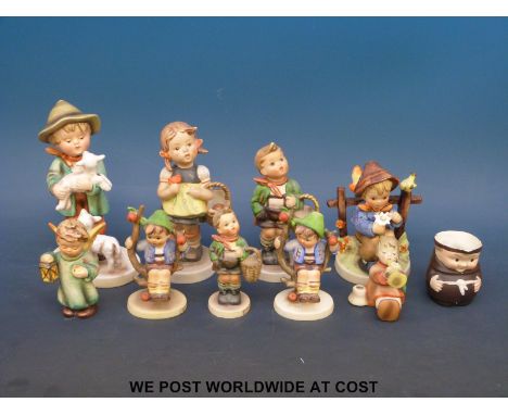 Ten Goebel ceramic figures, some early versions including a Toby jug