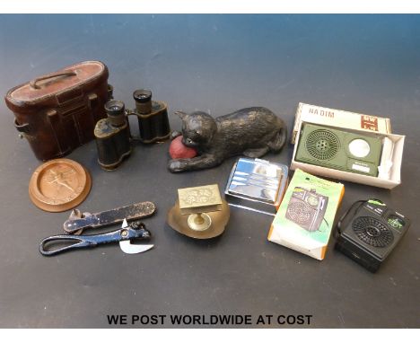 A pair of cased prismatic WWI era binoculars by the Precision Optical Co. stamped with large ministry arrow together with a c
