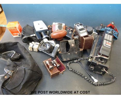 A collection of vintage cameras etc, includes Praktica Prinzlex 500, Braun Paxette, early cine etc, together with an early ce