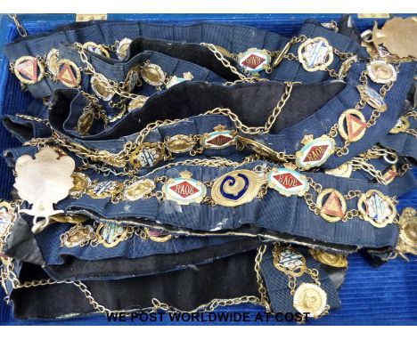 Two wooden boxes containing a large quantity of Masonic regalia and sashes including multiple enamel badges, one box solely S