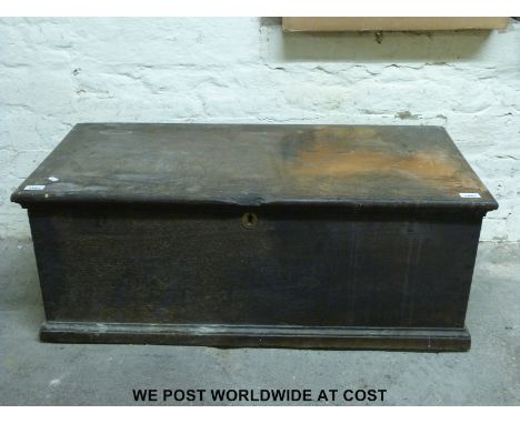 A 19thC oak trunk with candlebox (H36 x W96 x D46cm) 
