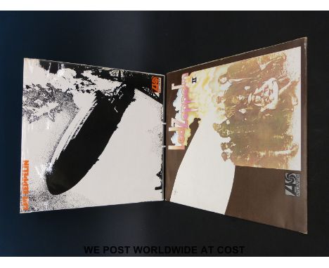 Led Zeppelin "I" & "II", both with red/maroon labels.  The first LP is a second pressing with orange lettering and A1/B1 matr
