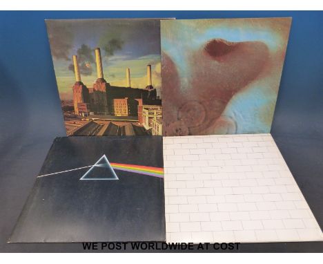 Four original Pink Floyd LPs: “Animals” (First pressing, A2U/B2U matrix numbers); “The Wall” (A2U/B5U/A1U/B3U matrix numbers)