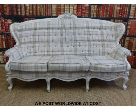 A French style Victorian three seat sofa with new upholstery and button decoration to back (length approximately 190cm)