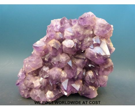 A large amethyst quartz geode with larger crystal formation (maximum diameter 15cm, 36cm wide)