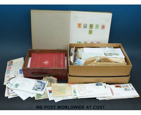 An album of Australian stamps, Australia and New Zealand first day covers and loose stamps