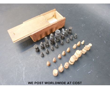 A small carved boxwood chess set, height of king 5cm