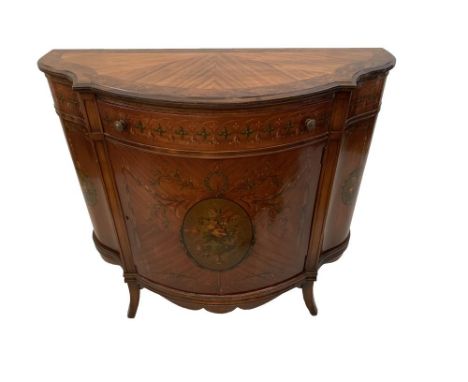 A Sheraton Revival painted satinwood commode by Johnson Hindley Johnson &amp; Co, Grand Rapids, Michigan, USA, on swept legs,