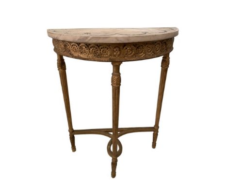 An Edwardian giltwood console of demi-lune outline, the marble inlaid with swags on fluted column legs, 82cm (32in) high x 65