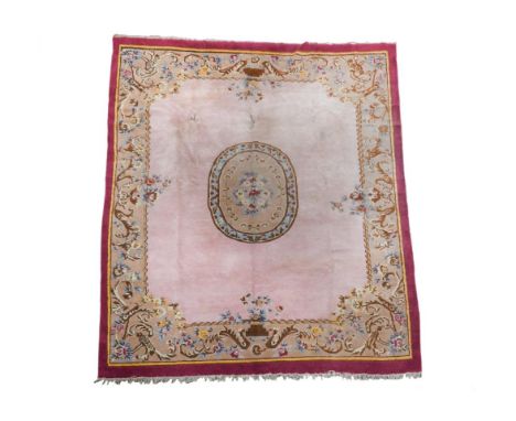 A French style pink ground salon carpet, 350 x 270cm (138 x 106.5in)  