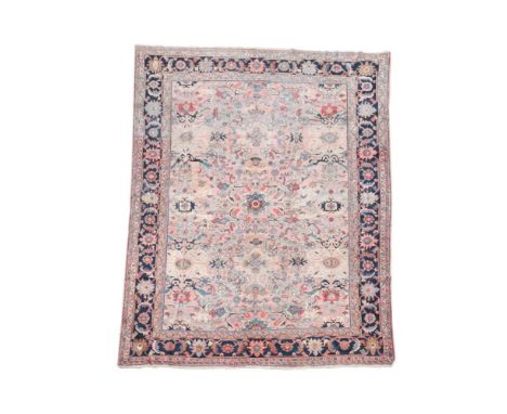 A faded Heriz pink ground Persian carpet, 357 x 277cm (141 x 109in)  