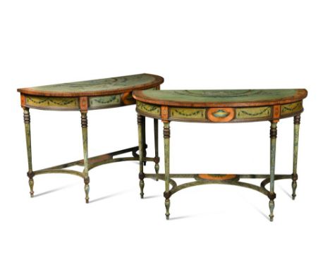 A pair of painted Neoclassical console tables, crossbanded in rosewood and satinwood, decorated with laurel, bellflower and r