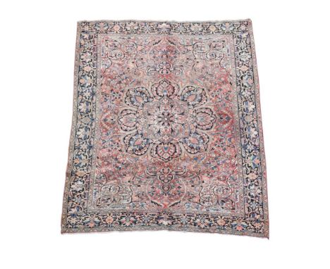 A Heriz faded brick ground carpet, 395 x 290cm (156 x 114in)  