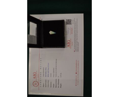 A fancy cabochon shaped natural opal with certificate.