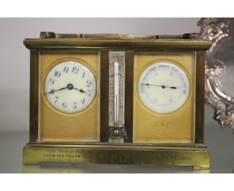 A brass combination carriage clock, barometer and thermometer.