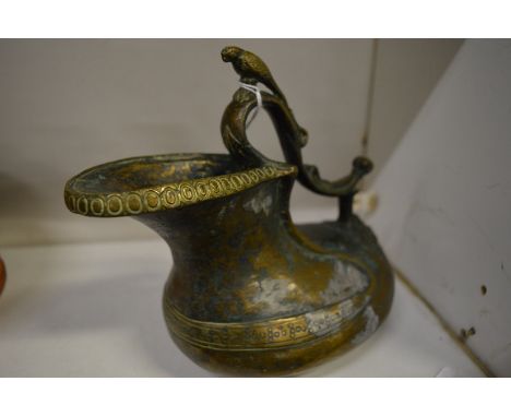 A classical bronze ewer or rhyton.