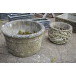Two reconstituted stone planters.
