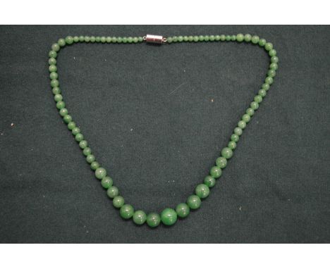 A jade bead necklace.