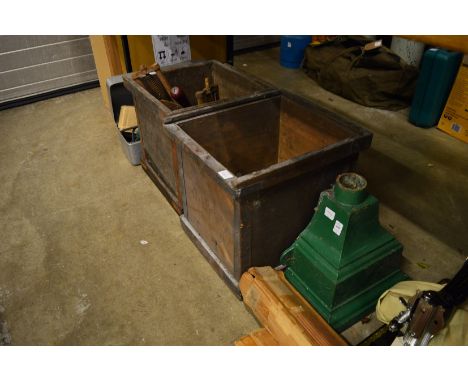 A cast iron rain water hopper, old wood working planes and other tools.