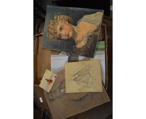 A small group of unframed artwork, mostly portrait subjects.