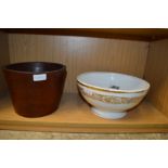 Porcelain bowl and a wooden jardiniere.