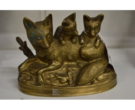 A small bronze group of a fox and cubs.