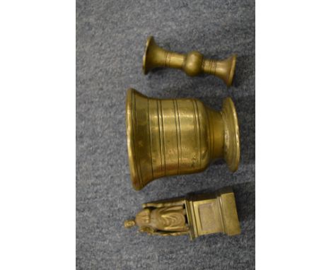 A bronze mortar and two other items.