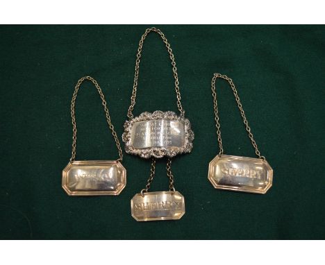 Various silver and other decanter labels.