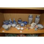 A collection of Chinese tea bowls and other items.