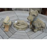 A garden ornament modelled as a dog and two other items.