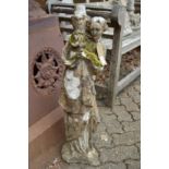 A reconstituted stone garden figure modelled as a classical women.
