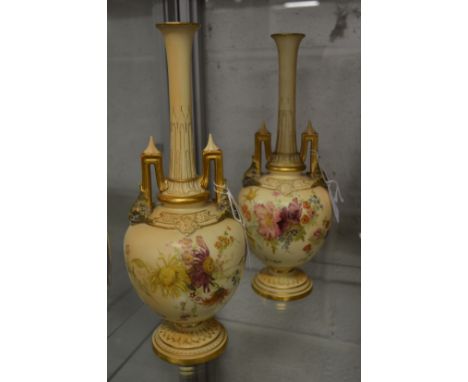 A pair of Royal Worcester blush ivory bottle vases.