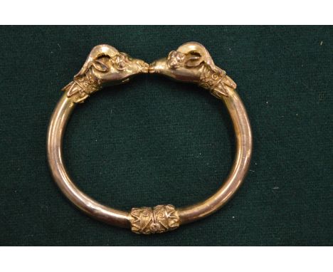 A silver gilt torque style bangle.