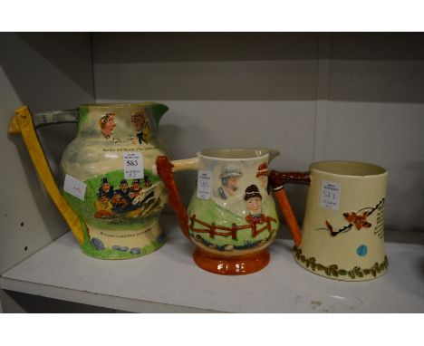 Large Crown Devon jug and similar musical jug and a musical tankard.