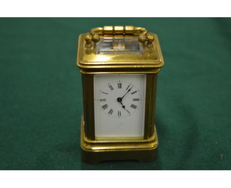 A miniature carriage clock.