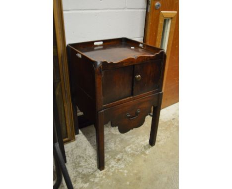 A George III mahogany commode.