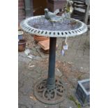 Cast metal bird bath.