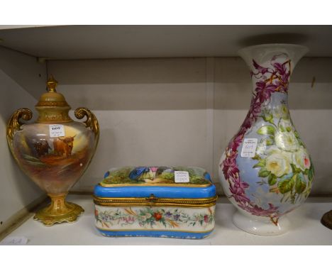 A Worcester style twin handled vase and cover decorated with cattle, a Continental porcelain box and cover and a floral decor