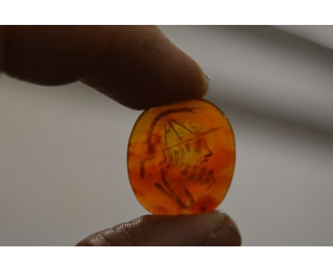 A carved intaglio bust.