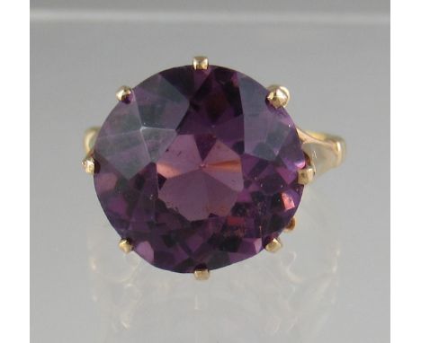 9ct gold amethyst ring. The oval amethyst approx 14mm. Ring size P. Approx weight 6.4 grams. (B.P. 21% + VAT)&nbsp;One chip a