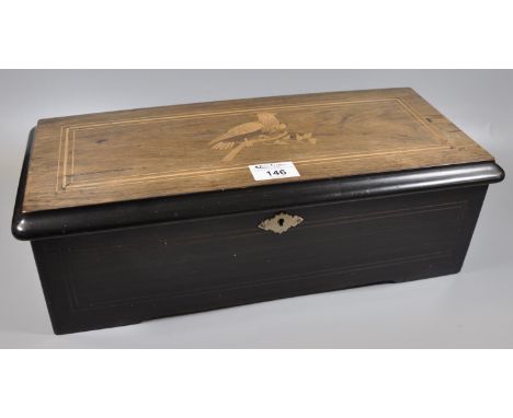 19th Century Swiss musical box the case with inlaid decoration, the mechanism playing eight aires on a 14.5cm steel cone. (B.