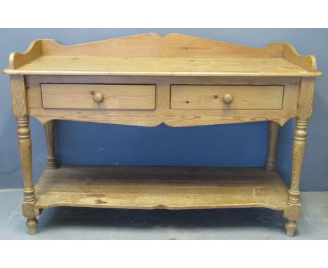 Pine tray topped side or serving table with two frieze drawers and under shelf on baluster turned legs, has been used as a sh