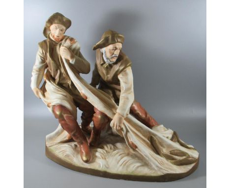 Royal Dux Art Nouveau porcelain figure group of two fishermen hauling in their catch with a net on naturalistic base, 40cm hi