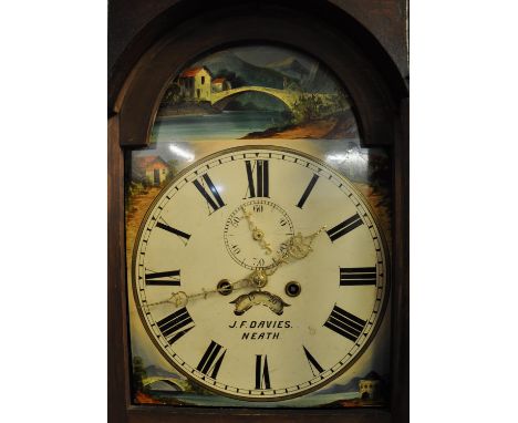 19th Century Welsh oak 8 day longcase clock marked J.F Davies of Neath, having naively carved and moulded broken arched pedim