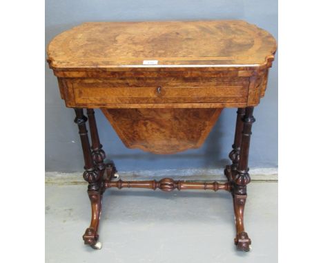 Victorian inlaid burr walnut sewing and games table, the hinged lid revealing backgammon, chess and cribbage board with pull 