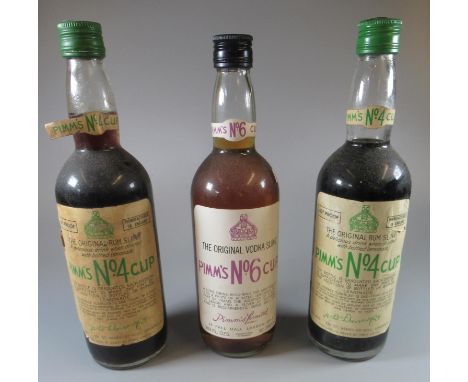 Two vintage bottles of Pimm's no. 4 cup, the original rum sling, 60% proof, together with Pimm's no. 6 cup, the original vodk