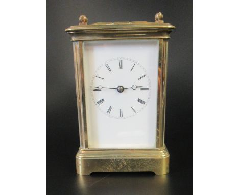 French brass carriage clock striking on one gong with full depth enamel dial. 14cm high approx. (B.P. 21% + VAT)Serial no. st