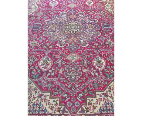 Multi-coloured ground vintage Persian Tabrez rug having geometric floral and foliate designs. 148 x 260cm approx. (B.P. 21% +